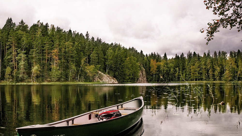 canoe sitting on water